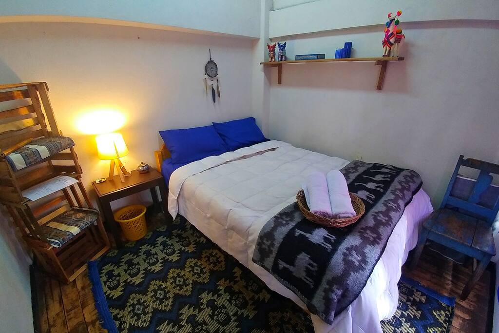 Master bedroom with a full size bed