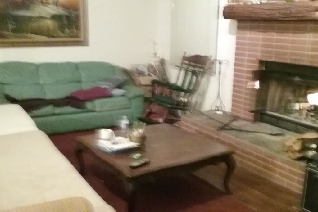 Living room with big fireplace