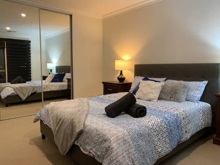 Spacious second bedroom with large robe