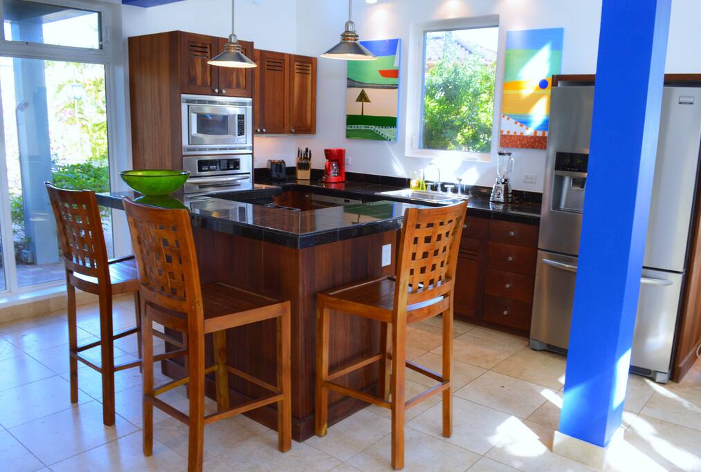 The kitchen has a bar