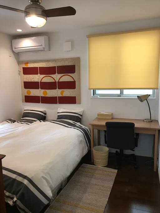 This is a private room you'll be renting! Two single beds and a working desk.