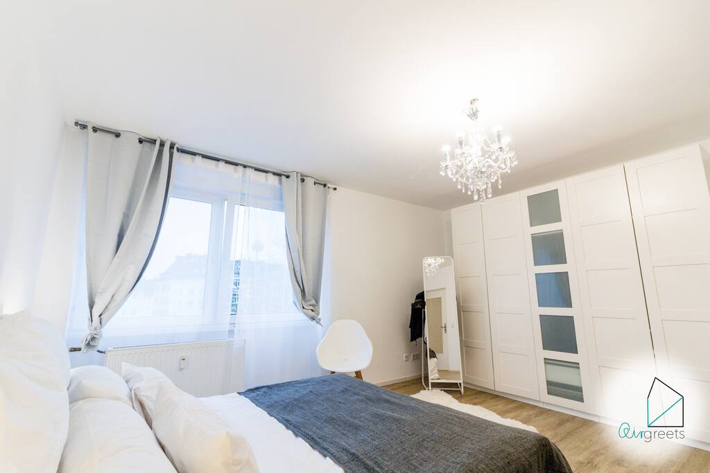 You will have space for your one luggage in the wardrobe behind the glass door.