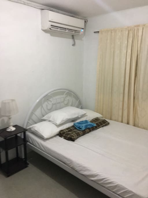 Bedroom 2 with king size bed and split typed aircon