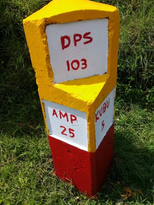 103 Km Pal in front of 103 Lodge