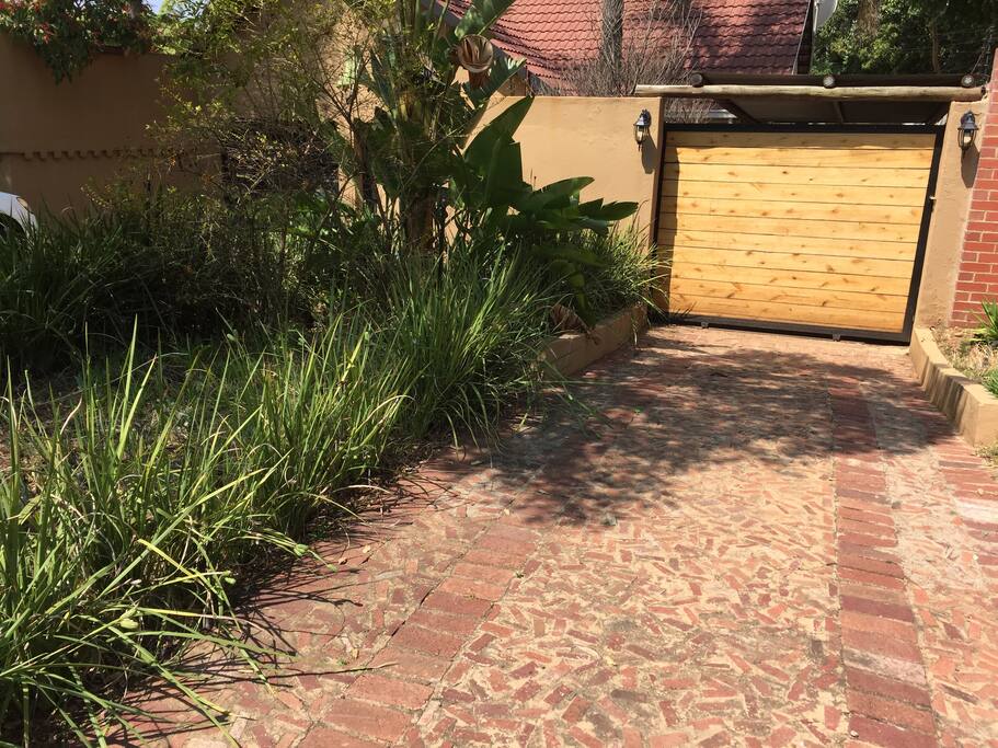 Own entrance with motorized gate