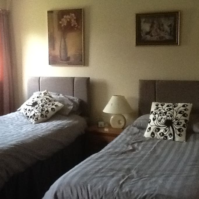 The double room set up with twin beds.