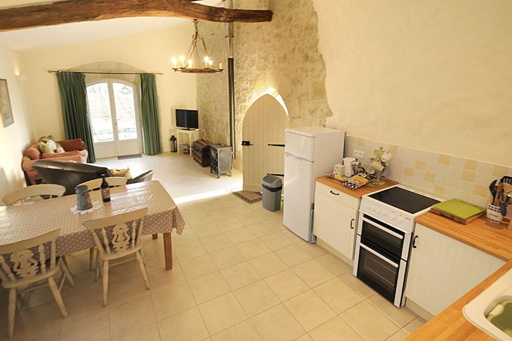 Lounge diner with fitted kitchen, TV and burn burner.