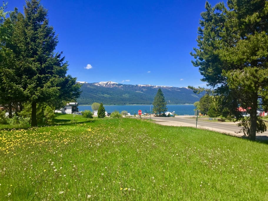 view from deck/front yard/living room/kitchen