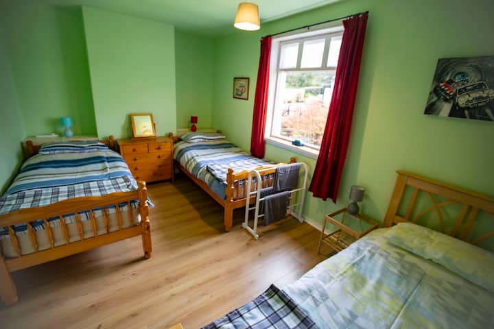 Bedroom 2 with 3 single beds