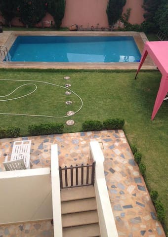 Beautiful room with pool and garden