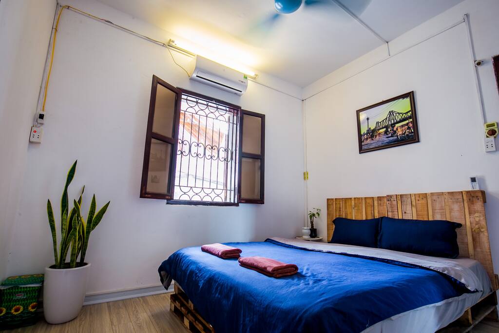 Brighten and airy bedroom with comfortable spring mattress
