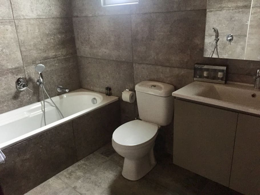 Large Bathroom with bath and separate shower