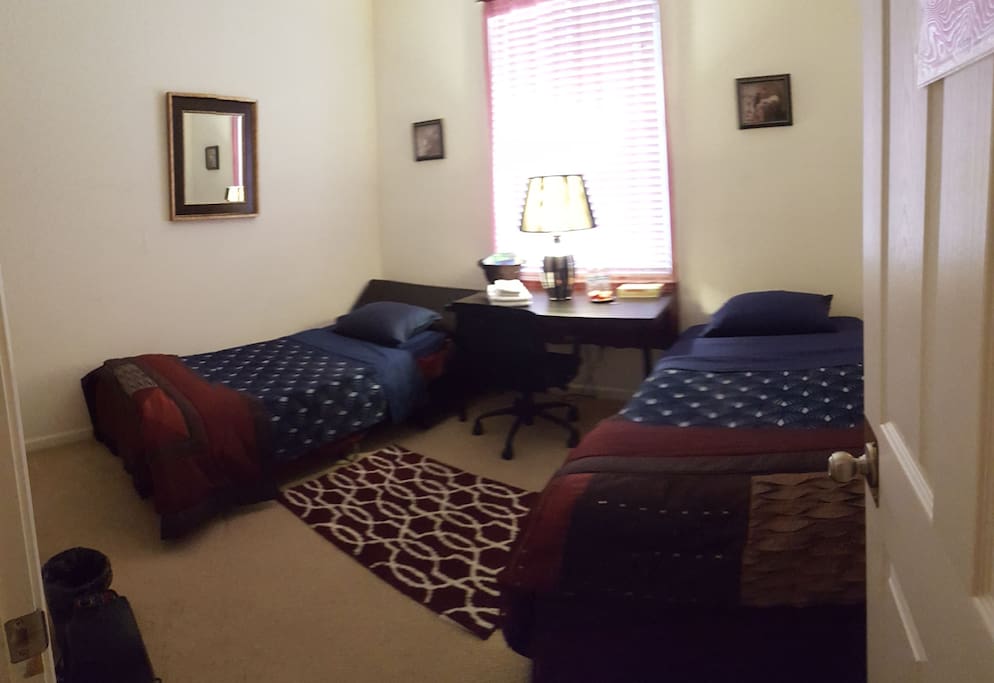 ROOM 1 of 2: Sunspear Room (1st floor) has 2 single-sized beds