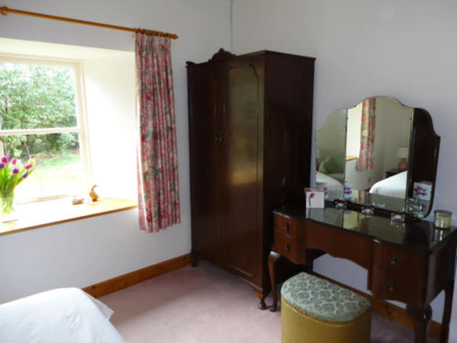 Wardrobe and dressing table in double bedroom