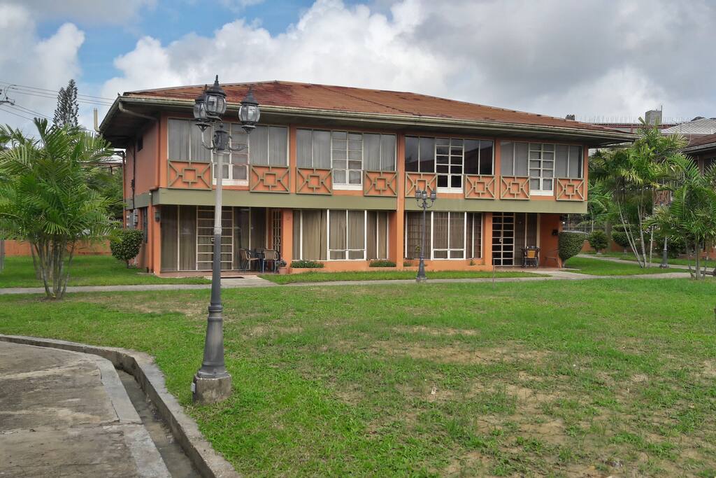 Front view with shared lawn
