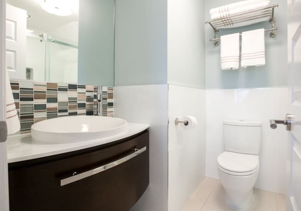 your private bathroom with stand up shower.