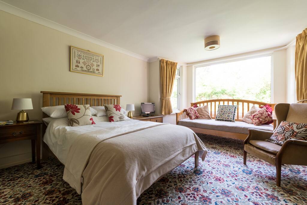 Bedroom 1, showing the sofa/bed in the bay window.