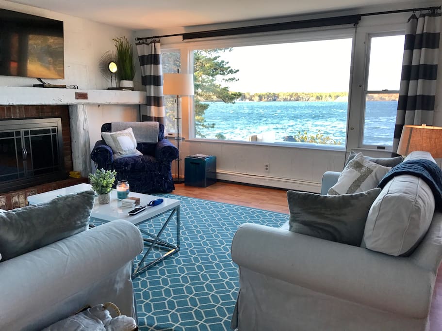 Spacious living room with plenty of seating. Waterfront views make you feel like you're on a ship.