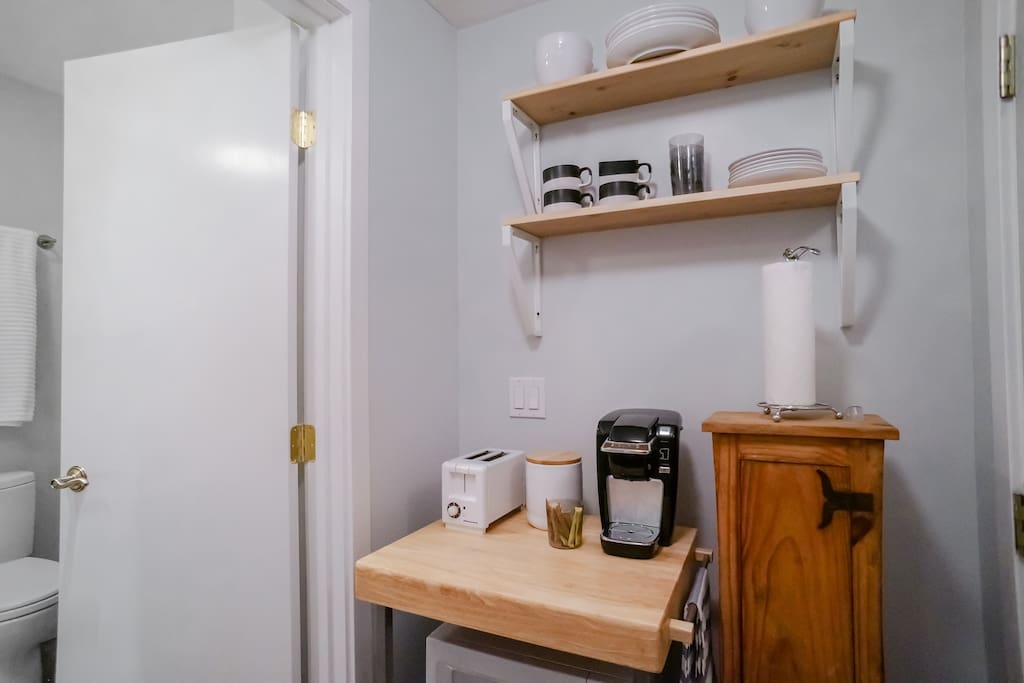 Entry way. Our apartment has a microwave, Keurig coffee maker, dishes and utensils for your use.