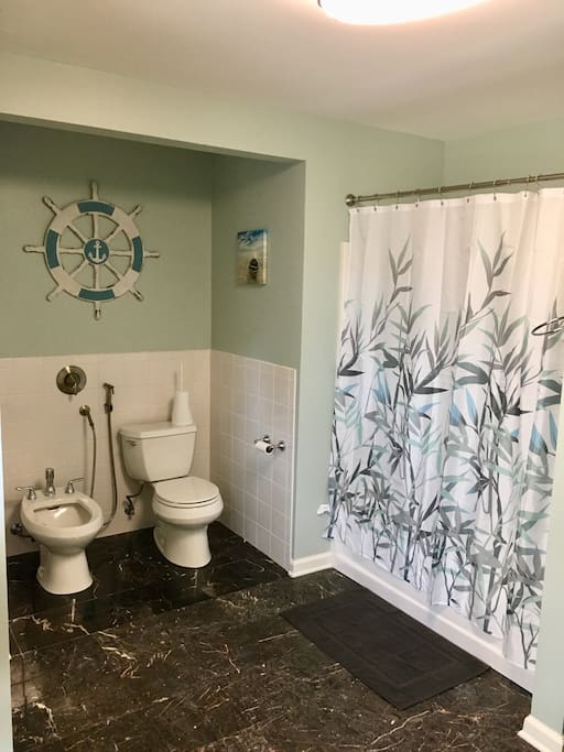 Beautiful bathroom with everything that you will need provided. Attached to your room