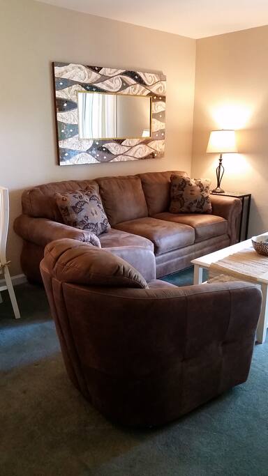 Comfy sofa with memory foam pullout bed.