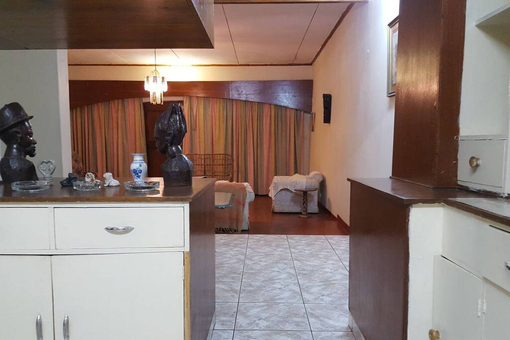 Open plan kitchen looking into the dinning room then into the living room.