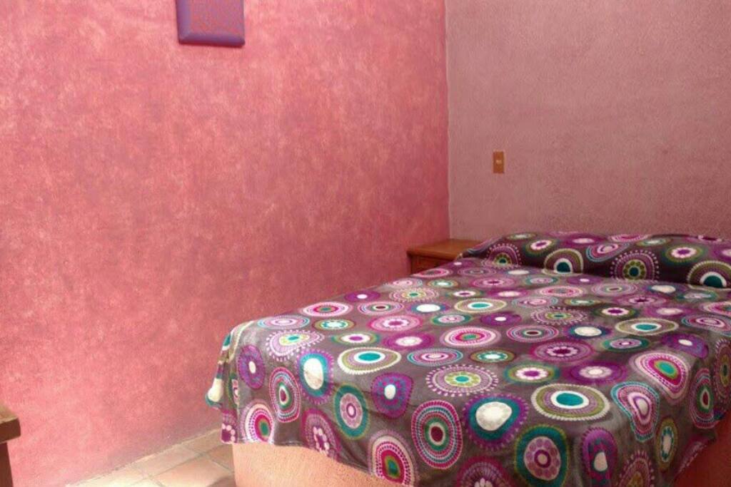 recámara 1 con cama matrimonial.