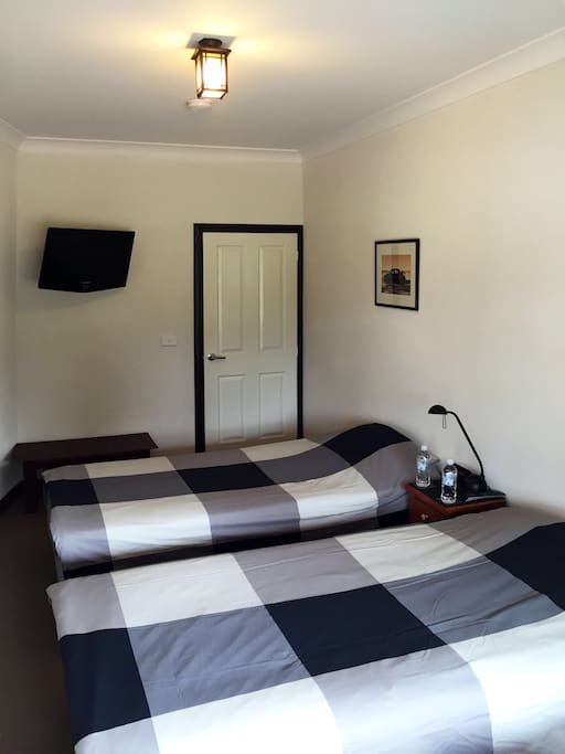 Bedroom 2 with 2 king single beds