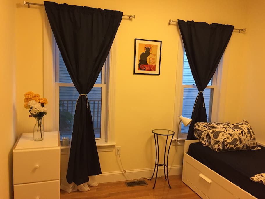 Your bedroom has 2 windows for good light, blackout curtains for good sleep, and options for clothes storage