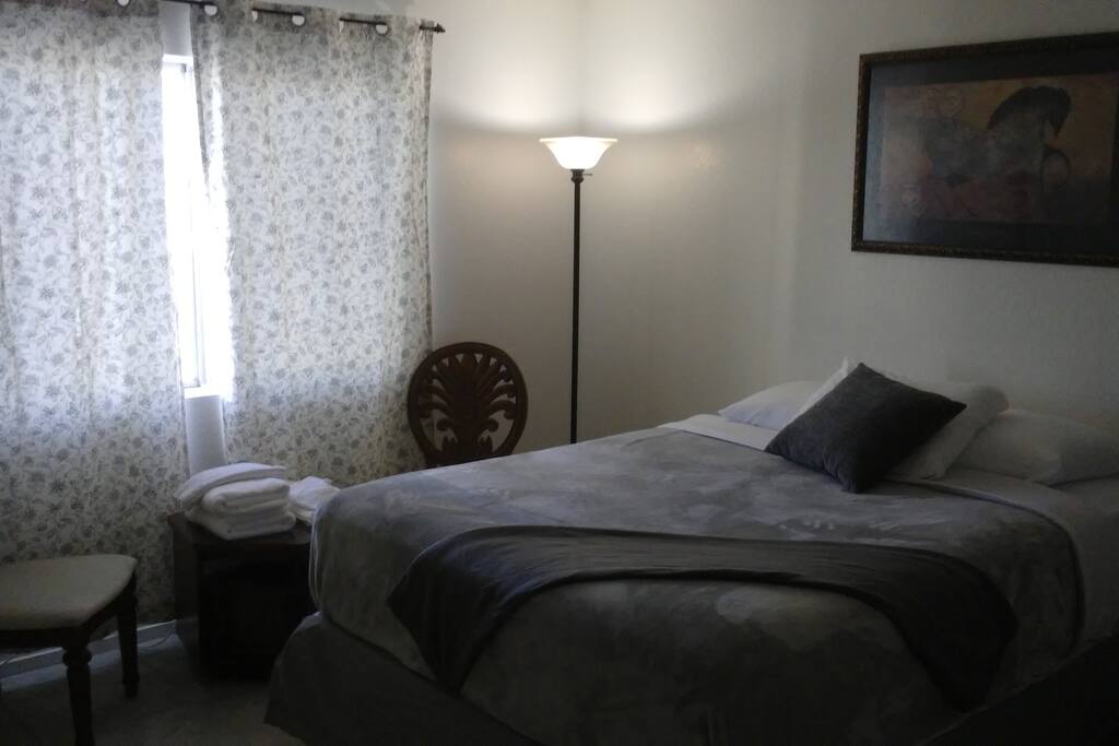 Comfortable brand new Queen size Serta mattress, , bathroom, closet, and beautiful table and chairs.