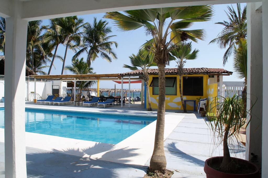 Pool with beach in background