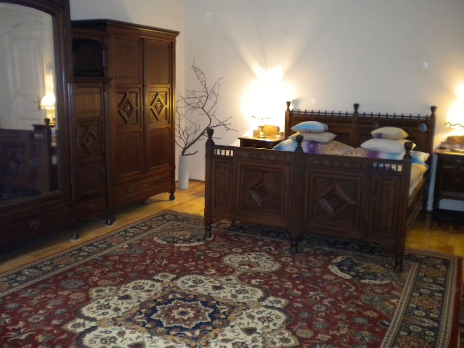 Old royal double bed in the bedroom