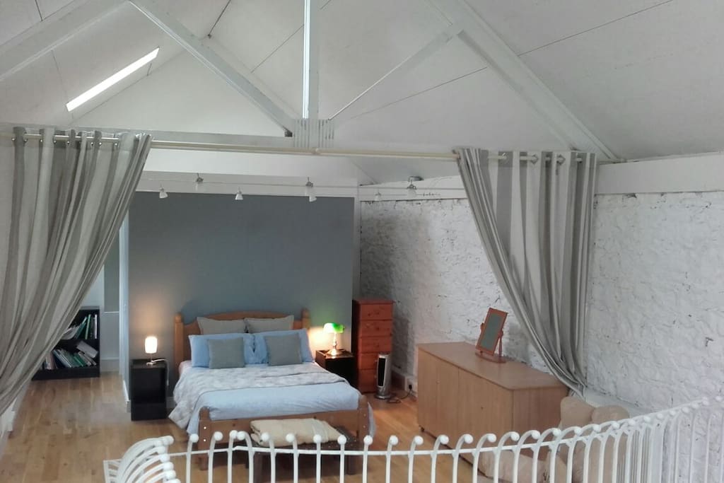 mezzanine bedroom with bathroom