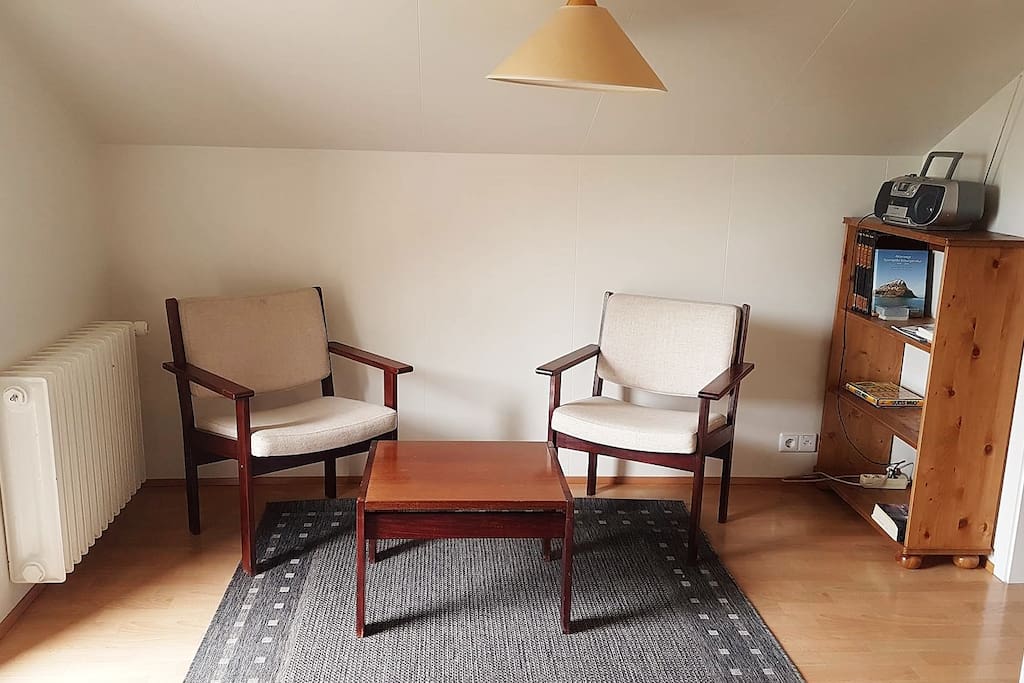 What you will first walk into is this cozy living room that leads into the bathroom and dining area. This room can also easily be turned into a sleeping area and there are two fold able beds that can be put there.