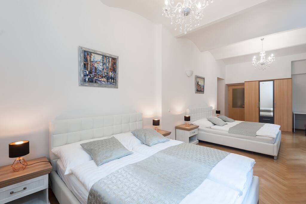 Bedroom with 1 King and 1 Queen Sized Beds