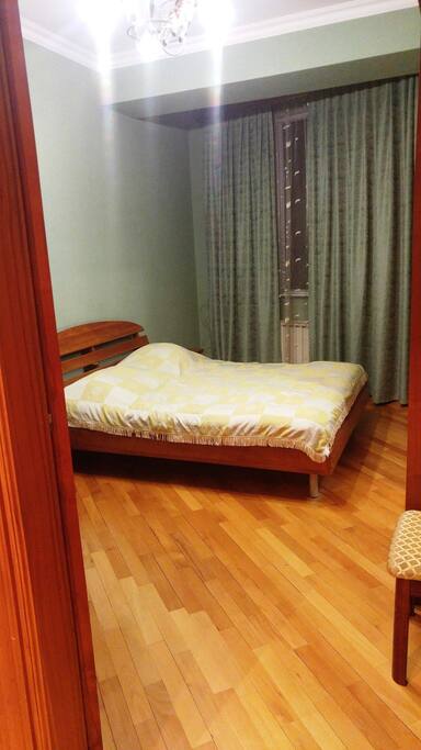 bedroom with a wardrobe and a desk