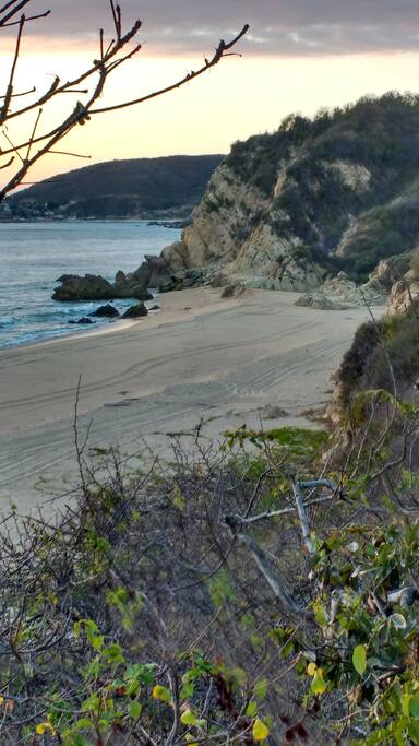 These rocks make for great wave-watching and there is a shady nook in the morning.