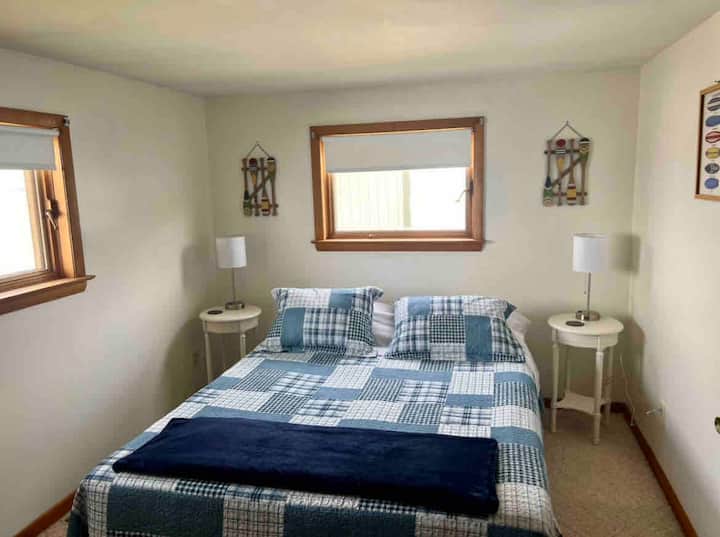 Queen sized memory foam bed with water view. The lamps both have USB ports to charge your phone.