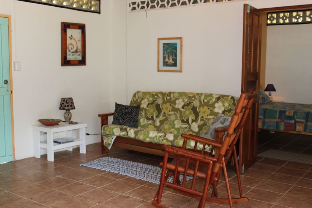 Sitting room in casita with futon, small TV