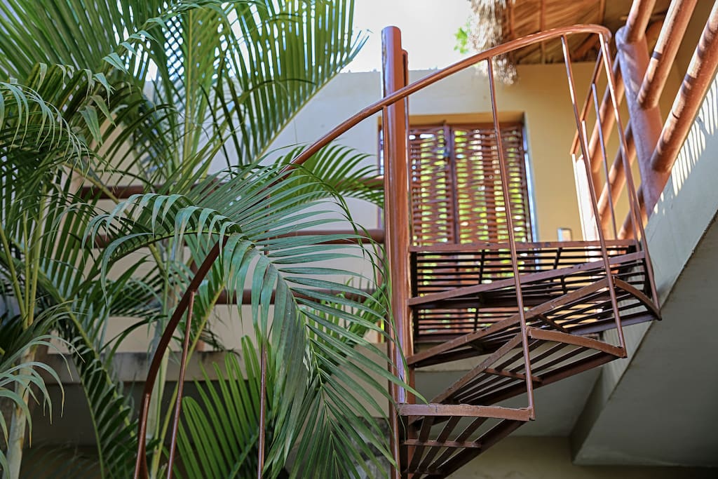 Spiral stairs leading to downstairs unit