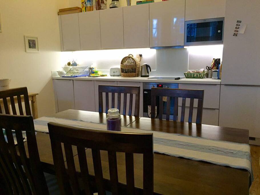 Large table, extends to hold 8 people.