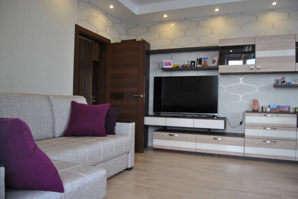 Lounge area, sofa with TV