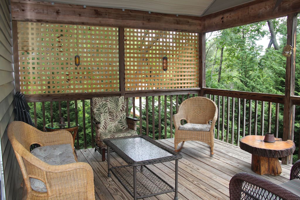 Covered porch. Seating for six. Long range views. No mosquitos.