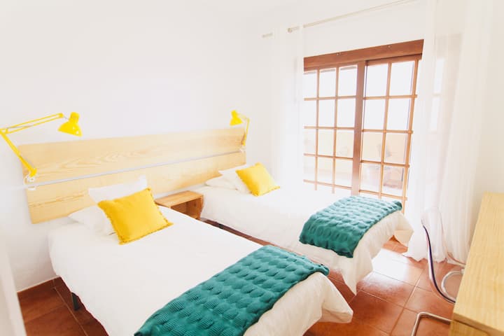 Nice bedroom with direct access to the big terrace, the beds are 2mts long