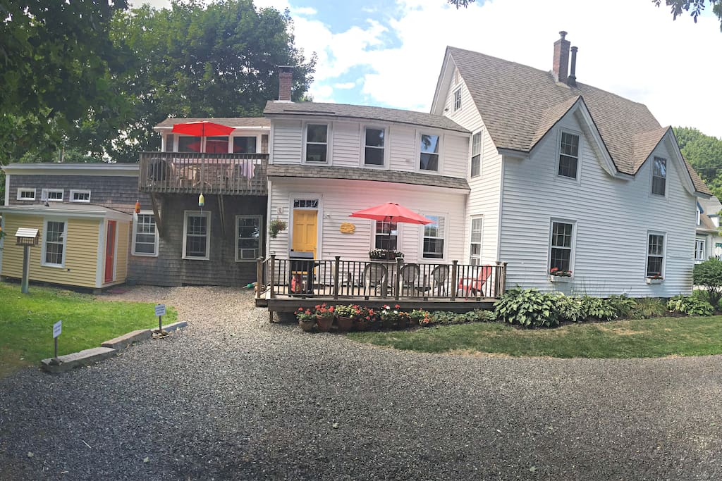 Panoramic view of the house. Cathy & George are to be found in the Caretaker Apartment to the far left - the red door!