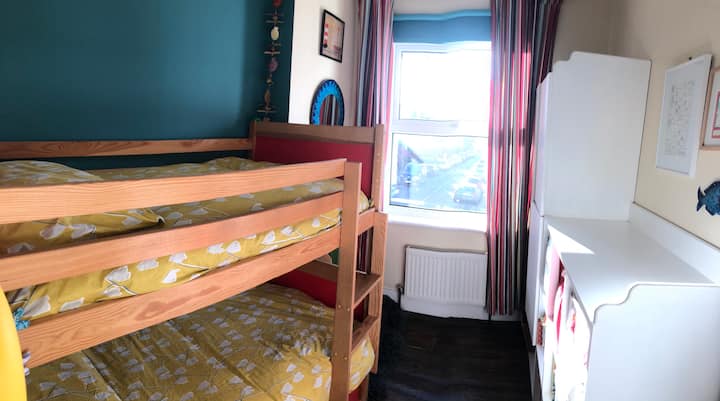 Small child’s bedroom with bunk bed. Please note this is a junior bunk bed so won’t sleep an adult. 

CD/radio player in room.