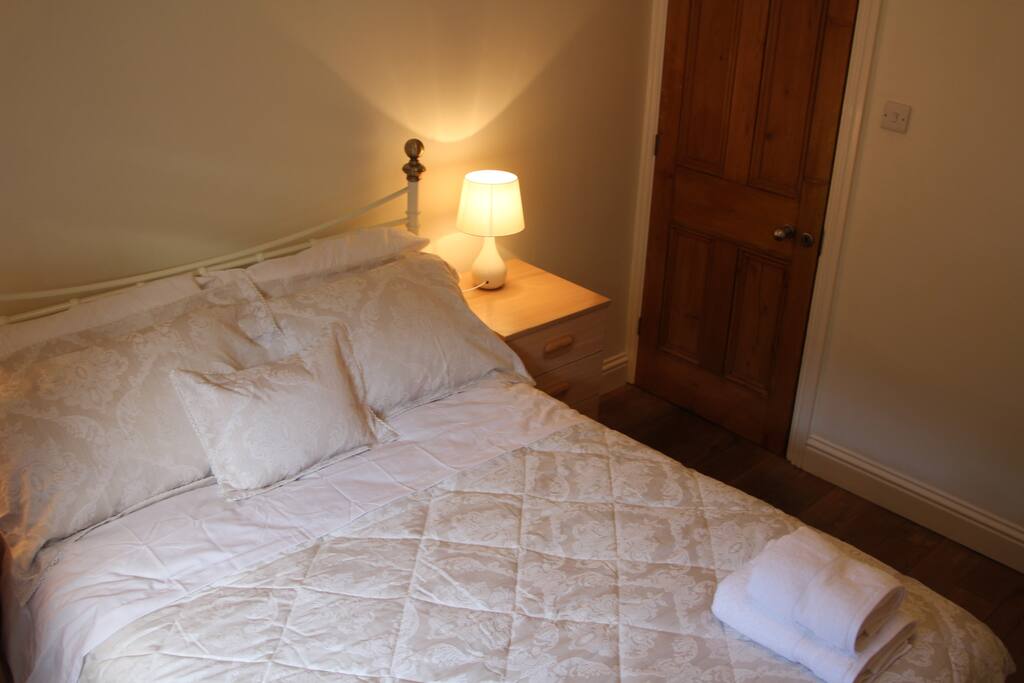 The cream double bed is extremely comfortable. Large double wardrobe in this room too. Also space for folding bed if there are 5 guests