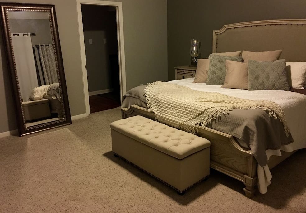 Master bedroom-open door leads to his/her sinks, closet, shower and toilet.