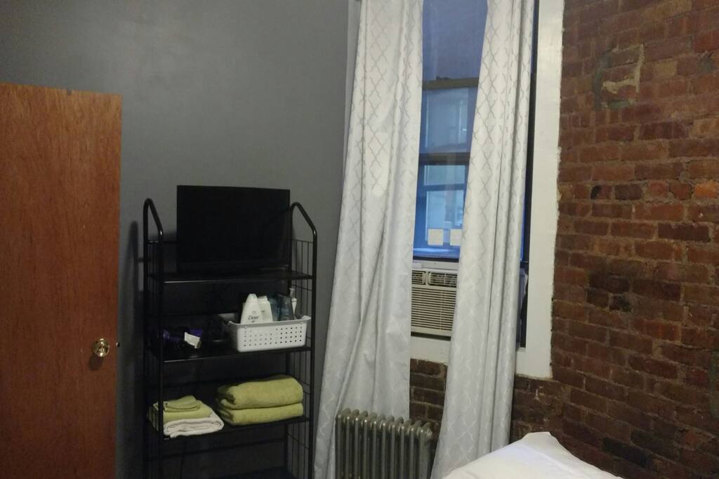 window with ac unit.