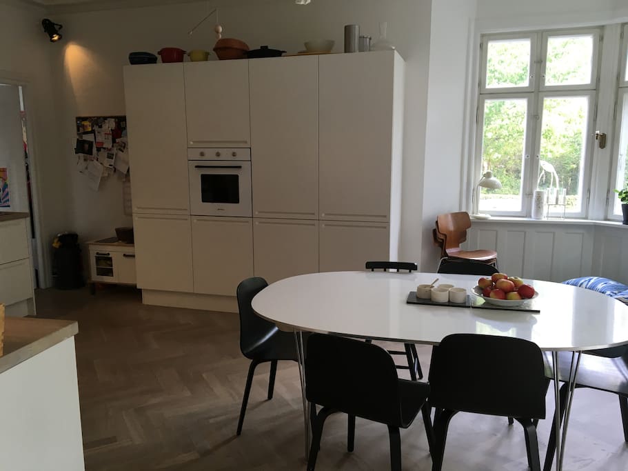 Large kitchen with lots of kitchenware
